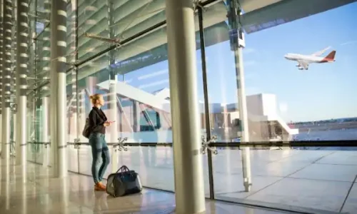 man-with-umbrella-airport